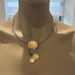 Elegant Gold and Silver Pendant Necklace